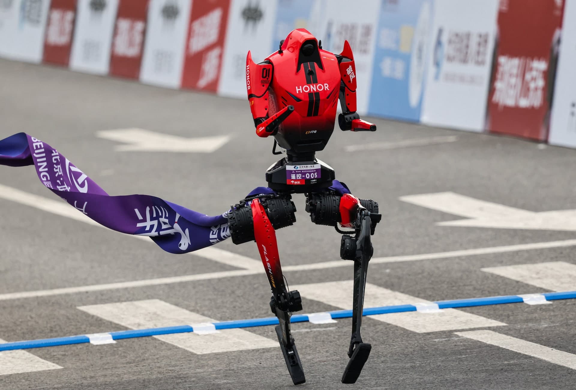 Humanoid robots competing in a race at the World Humanoid Robot Games in Beijing