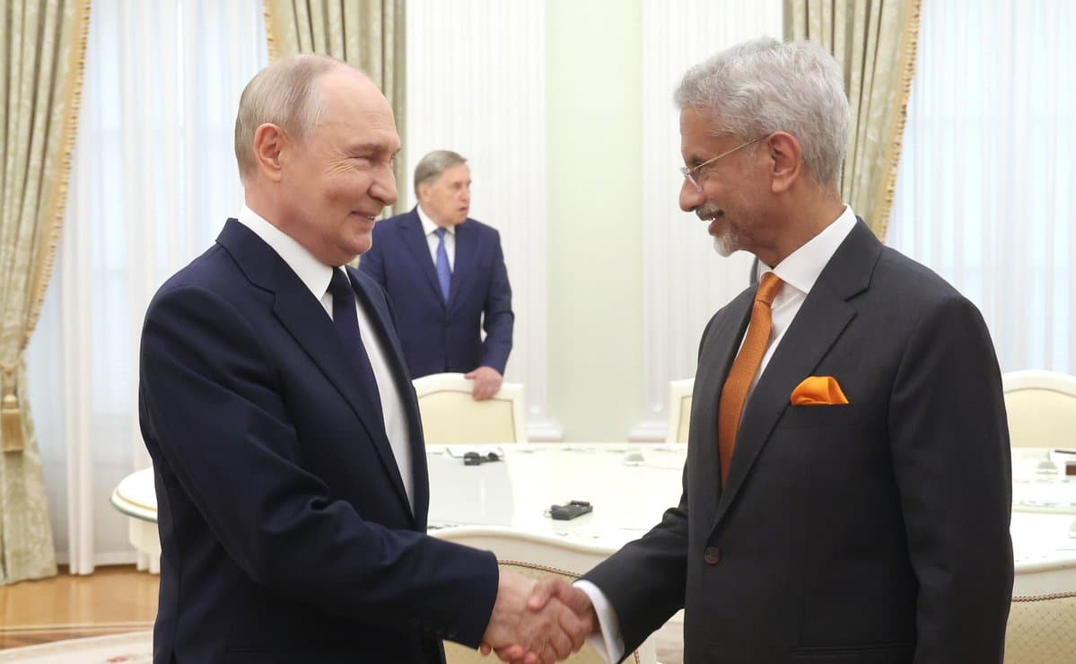 S. Jaishankar and Vladimir Putin shaking hands in Moscow