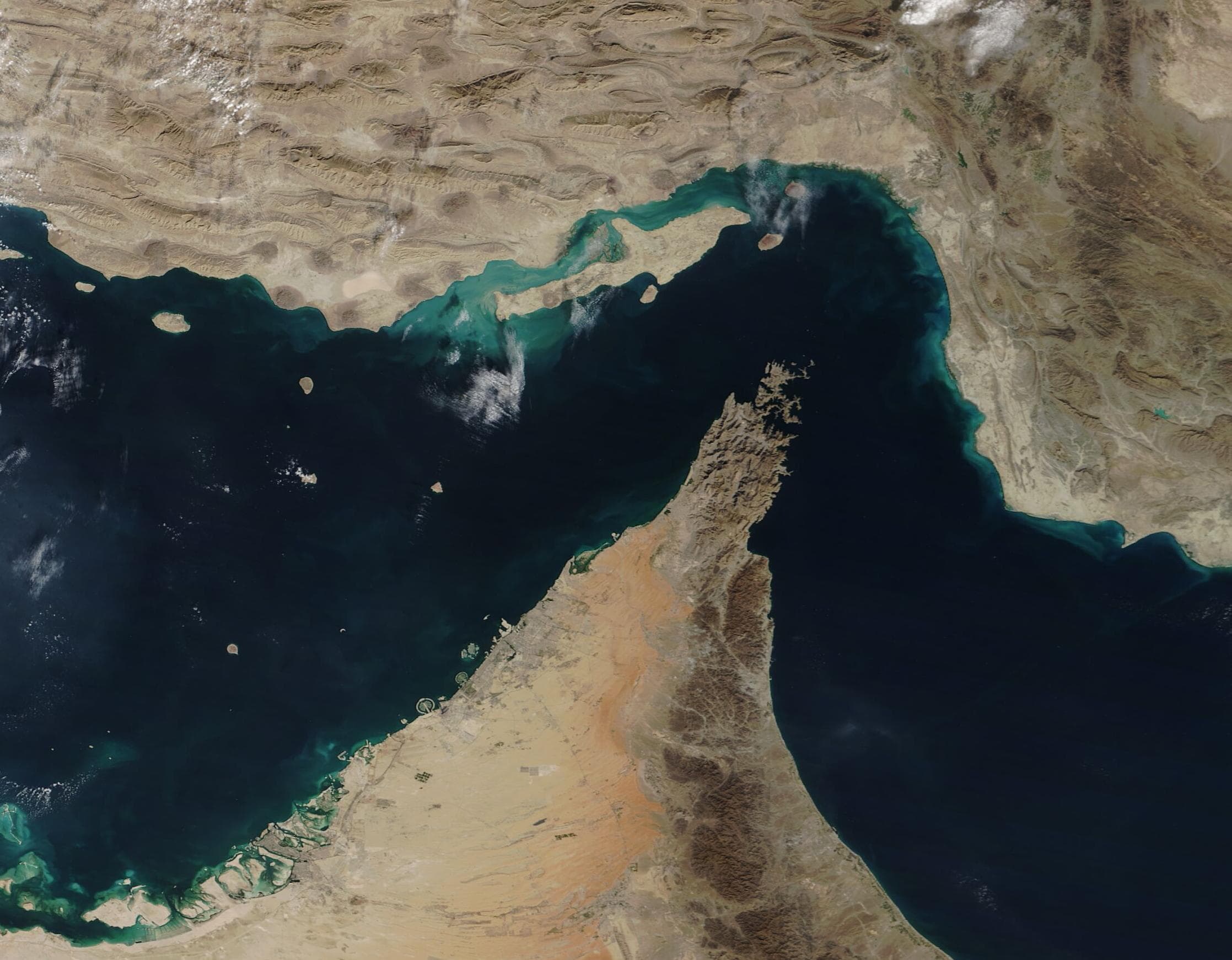 NASA MODIS true-color satellite image of the Strait of Hormuz between Iran and the Arabian Peninsula