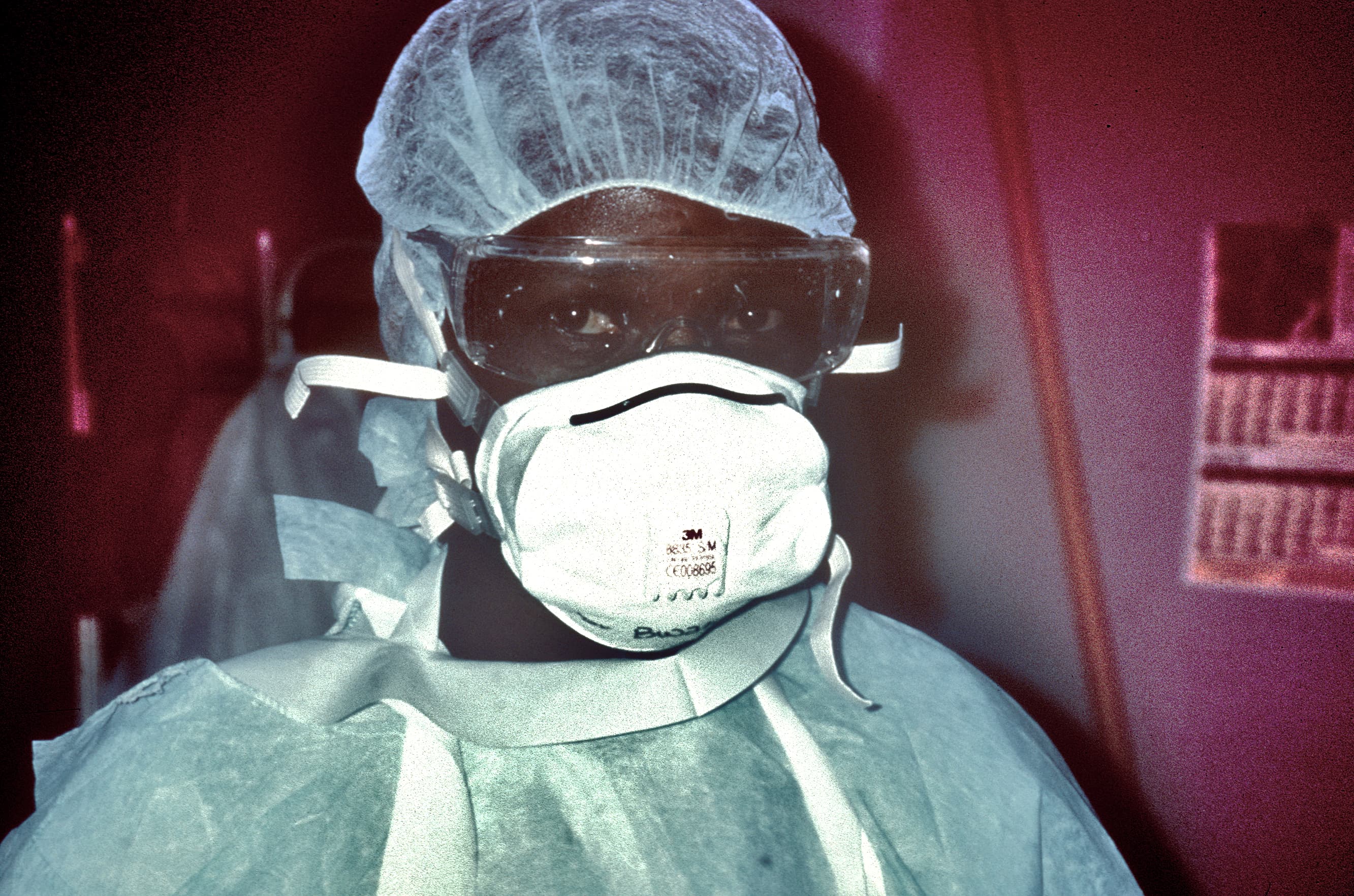 A nurse in full protective equipment preparing to enter an Ebola isolation ward, from the CDC Public Health Image Library