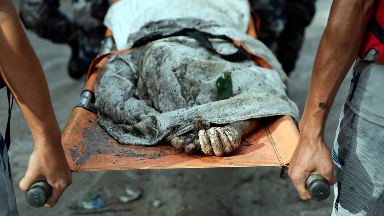 Mud and wreckage along the Nepal flood path where Indian workers and pilgrims remain uncontactable